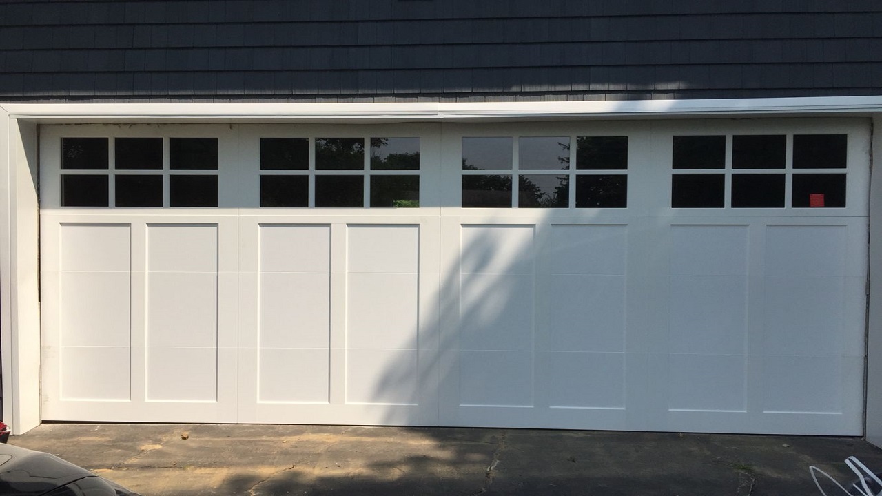 Enhancing Security: Key Features for Your 16x8 Garage Door
